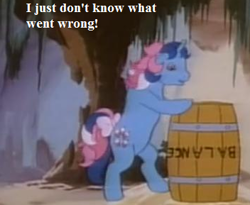 Size: 352x289 | Tagged: safe, derpibooru import, edit, edited screencap, screencap, fizzy, g1, my little pony 'n friends, the last roundup, barrel, bow, cave, cropped, dell dwellers' cave, frazzit barrel, i just don't know what went wrong, mish mash melee, tail bow, text