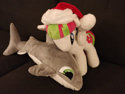 Size: 2000x1500 | Tagged: safe, artist:galekz, artist:skippymagrue, derpibooru import, blossomforth, pony, shark, christmas, cuddling, hat, holiday, irl, photo, plushie, santa hat, shark plushie