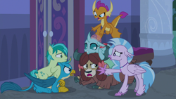 Size: 1280x720 | Tagged: safe, derpibooru import, screencap, gallus, ocellus, sandbar, silverstream, smolder, yona, changedling, changeling, classical hippogriff, dragon, earth pony, griffon, hippogriff, pony, yak, school raze, bow, cloven hooves, colored hooves, dragoness, female, hair bow, jewelry, male, monkey swings, necklace, ponies riding griffons, student six, teenager