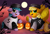 Size: 2516x1689 | Tagged: safe, artist:pridark, derpibooru import, oc, oc only, oc:dipsy, oc:iona, clothes, cloven hooves, costume, cute, full moon, glasses, green eyes, halloween, holiday, jack-o-lantern, moon, night, ocbetes, one eye closed, pepper shaker, pumpkin, raised hoof, salt shaker, stars, underhoof, wink