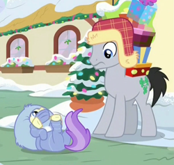 Size: 915x868 | Tagged: safe, derpibooru import, screencap, alula, lucky clover, earth pony, pony, best gift ever, christmas, christmas lights, clothes, cropped, cute, duo, female, filly, foal, hat, holiday, male, on back, ponyville, present, snow, stallion