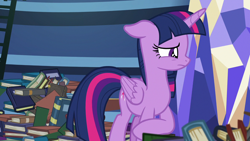 Size: 1280x720 | Tagged: safe, derpibooru import, screencap, twilight sparkle, twilight sparkle (alicorn), alicorn, father knows beast, book, floppy ears, ladder, library, sad, solo, twilight's castle, twilight's castle library