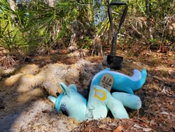 Size: 4032x3024 | Tagged: safe, artist:hoppip, lyra heartstrings, pony, unicorn, 4chan, dirt, female, grave, gravestone, hole, insertion, irl, lyra plushie, mare, op is a cuck, outdoors, photo, plant, plothole plush lyra, plushie, shovel, solo