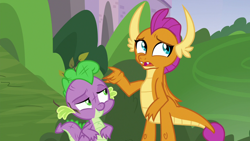 Size: 1280x720 | Tagged: safe, derpibooru import, screencap, smolder, spike, dragon, father knows beast, dragoness, duo, female, male, messy, raised arm, twig, winged spike