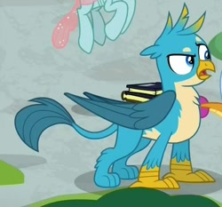 Size: 578x538 | Tagged: safe, derpibooru import, screencap, gallus, ocellus, griffon, what lies beneath, book, claws, cropped, male, offscreen character, open mouth, paws, raised eyebrow, tail, wings