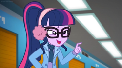 Size: 1600x898 | Tagged: safe, screencap, sci-twi, twilight sparkle, equestria girls, equestria girls series, holidays unwrapped, spoiler:eqg series (season 2), ceiling light, clothes, glasses, pointing, ponytail, solo, squint, winter outfit