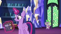 Size: 1280x720 | Tagged: safe, derpibooru import, screencap, spike, twilight sparkle, twilight sparkle (alicorn), alicorn, dragon, father knows beast, book, library, twilight's castle, twilight's castle library, winged spike