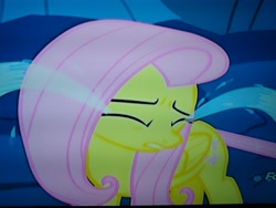 Size: 4160x3120 | Tagged: safe, screencap, fluttershy, changeling, pegasus, pony, to where and back again, closed wing, cropped, crying, discovery family logo, disguise, disguised changeling, eyes closed, feelings, frown, hurt/comfort, hurting, looking away, ocular gushers, photo, picture of a screen, sad, solo, stuck