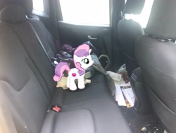 Size: 4032x3024 | Tagged: safe, photographer:undeadponysoldier, sweetie belle, pony, unicorn, augmented reality, car, cutie mark, female, filly, gameloft, gameloft shenanigans, irl, photo, ponies in real life, solo, the cmc's cutie marks