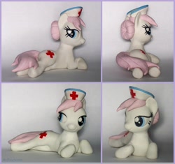 Size: 4792x4512 | Tagged: safe, artist:madponyscientist, nurse redheart, earth pony, pony, bedroom eyes, craft, female, hat, irl, lying down, mare, multiple angles, nurse hat, photo, side glance, solo