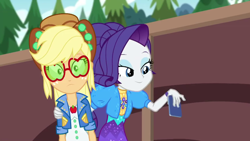 Size: 1280x720 | Tagged: safe, screencap, applejack, rarity, better together, equestria girls, festival filters, cellphone, clothes, dress, hat, jacket, phone, shipping fuel, sunglasses