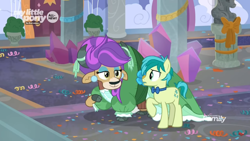 Size: 1366x768 | Tagged: safe, screencap, sandbar, yona, earth pony, pony, yak, she's all yak, alternate hairstyle, bow, bowtie, carpet, clothes, cloven hooves, confetti, discovery family logo, dress, duo, ear piercing, earring, eyeshadow, female, jewelry, makeup, male, pearl earrings, piercing, purple hair, teenager, wig