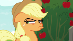 Size: 1280x720 | Tagged: safe, derpibooru import, screencap, applejack, earth pony, pony, going to seed, apple, apple tree, female, floppy ears, freckles, frown, mare, pouting, pursed lips, solo, suspicious, tree