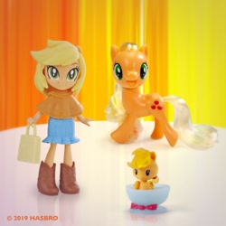 Size: 960x960 | Tagged: safe, applejack, equestria girls, applejack month, cutie mark crew, facebook, fashion squad, hatless, jackletree, missing accessory, multeity, official, toy, trio