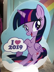 Size: 510x680 | Tagged: safe, photographer:transformartive, twilight sparkle, twilight sparkle (alicorn), alicorn, pony, 2019, comic con, cutie mark, female, irl, mare, official, photo, rearing, san diego comic con, sdcc 2019, smiling, wings