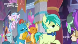Size: 1280x720 | Tagged: safe, screencap, gallus, ocellus, sandbar, silverstream, smolder, yona, changedling, changeling, classical hippogriff, dragon, earth pony, griffon, hippogriff, pony, yak, she's all yak, amused, balloon, blinking, bowtie, claws, confused, covering mouth, cupcake, curved horn, cutie mark, discovery family logo, dragoness, eyes closed, eyeshadow, female, flying, folded wings, food, frown, horn, horns, laughing, makeover, makeup, male, oh my god, raised hoof, smiling, snickering, spread wings, student six, talons, teenaged dragon, teenager, wig, wings