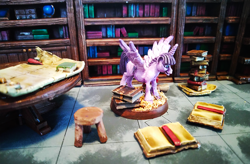 Size: 1200x785 | Tagged: safe, artist:velgarn, derpibooru exclusive, twilight sparkle, twilight sparkle (alicorn), alicorn, pony, book, bookhorse, bookshelf, excited, figurine, gaming miniature, library, map, miniature, pewter ponies, photo, pile of books, scenery, solo, stool, table