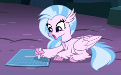 Size: 1010x628 | Tagged: safe, screencap, silverstream, classical hippogriff, hippogriff, pony, uprooted, cave, chalk, cropped, cute, diastreamies, drawing, female, graph paper, happy, open mouth, prone, smiling, solo, the place where we belong