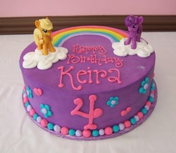 Size: 600x524 | Tagged: safe, derpibooru import, applejack, twilight sparkle, earth pony, pony, cake, cloud, food, my little pony, rainbow, text