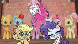 Size: 640x363 | Tagged: safe, screencap, applejack, pinkie pie, rarity, earth pony, pegasus, pony, unicorn, my little pony: pony life, 2020, female, looking at you, mare, mixed media, official, toy