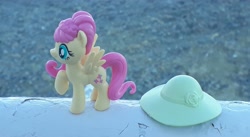 Size: 4096x2241 | Tagged: safe, artist:dingopatagonico, fluttershy, pony, hat, irl, photo, solo, toy