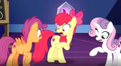 Size: 1089x597 | Tagged: safe, screencap, apple bloom, scootaloo, sweetie belle, growing up is hard to do, cutie mark, cutie mark crusaders, imdb, older, older apple bloom, older cmc, older scootaloo, older sweetie belle, raised hoof, surprised, the cmc's cutie marks