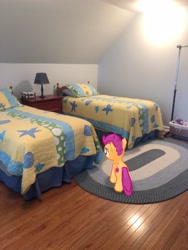 Size: 3024x4032 | Tagged: safe, photographer:undeadponysoldier, scootaloo, pegasus, pony, augmented reality, bed, bedroom, carpet, female, filly, gameloft, irl, lamp, photo, pillow, ponies in real life, solo