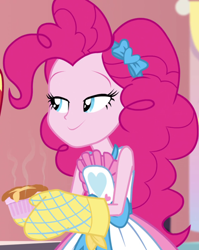 Size: 858x1080 | Tagged: safe, screencap, pinkie pie, equestria girls, equestria girls series, holidays unwrapped, spoiler:eqg series (season 2), apron, bow, clothes, cropped, female, food, hair bow, kitchen, lidded eyes, oven mitts, raised eyebrows, ramekin, saving pinkie's pie, skirt, sleeveless, sleeveless shirt, smiling, solo, souffle