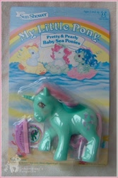 Size: 408x610 | Tagged: safe, photographer:einhornbaby, beachcomber (g1), fizzy, ripple (g1), surf rider, sea pony, bow, comb, hair bow, official, packaging, pretty and pearly baby sea ponies, toy, you had one job