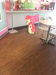 Size: 3024x4032 | Tagged: safe, photographer:undeadponysoldier, apple bloom, earth pony, pony, augmented reality, chair, female, filly, frozen yogurt shop, gameloft, irl, photo, ponies in real life, solo, sweet frog, table