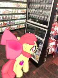 Size: 3024x4032 | Tagged: safe, photographer:undeadponysoldier, apple bloom, earth pony, pony, augmented reality, female, filly, gameloft, gamestop, irl, nintendo ds, photo, ponies in real life