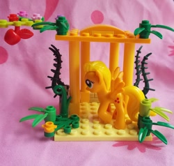 Size: 1280x1218 | Tagged: safe, artist:heckyeahponyscans, derpibooru import, applejack, pegasus, pony, bootleg, bootleg lego, flapplejack, irl, my little lony, photo, race swap, solo, toy