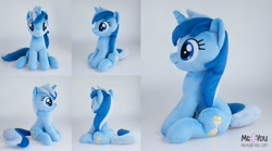 Size: 1199x667 | Tagged: safe, artist:meplushyou, minuette, pony, unicorn, female, irl, looking at you, mare, photo, plushie, sitting, smiling, solo