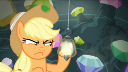 Size: 1674x941 | Tagged: safe, derpibooru import, screencap, applejack, earth pony, pony, dragon dropped, eyebrows, female, gem, gem cave, lantern, mare, shrunken pupils, solo