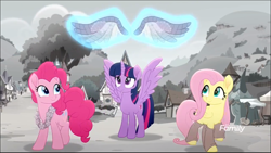 Size: 1367x772 | Tagged: safe, derpibooru import, screencap, fluttershy, pinkie pie, twilight sparkle, twilight sparkle (alicorn), alicorn, earth pony, pegasus, pony, rainbow roadtrip, clothes, cropped, female, leg warmers, leggings, lei, levitation, magic, magic aura, mare, smiling, spread wings, telekinesis, trio, wing bling, wings