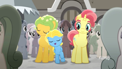 Size: 1366x768 | Tagged: safe, screencap, dawn droplet, earth pony, pegasus, pony, unicorn, rainbow roadtrip, background pony, building, colored, colt, crowd, cute, desaturated, discovery family logo, family, father and child, father and son, female, flower, flower in hair, grayscale, happy, jasmine breeze, like father like son, male, mare, monochrome, mother and child, mother and son, parent and child, raised hoof, rich harvest, sideburns, stallion, thick eyebrows, unnamed pony