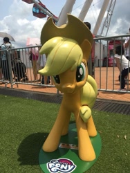 Size: 720x960 | Tagged: safe, derpibooru import, photographer:henrychan, applejack, earth pony, human, pony, friendship festival, hong kong, irl, irl human, photo, solo focus, statue