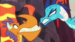Size: 2100x1180 | Tagged: safe, screencap, billy (dragon), princess ember, dragon, sweet and smoky, angry, dragon lands, dragoness, duo, female, furious, gritted teeth, horns, lava, male, narrowed eyes, scared, snarling
