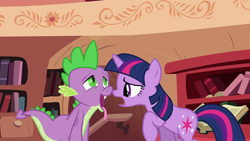 Size: 1920x1080 | Tagged: safe, screencap, spike, twilight sparkle, unicorn twilight, dragon, pony, unicorn, secret of my excess, ahegao, duo, female, golden oaks library, male, mare, open mouth, raised hoof, tongue out