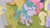 Size: 1524x852 | Tagged: safe, derpibooru import, screencap, applejack, aura (character), bon bon, cherry berry, dinky hooves, sweetie drops, written script, earth pony, pony, the mysterious mare do well, clothes, dirty, female, filly, foal, grass, happy, heart, messy mane, mud, muddy, open mouth, raised hoof, shadow, solo focus, you're my hero rainbow dash