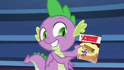 Size: 1366x768 | Tagged: safe, screencap, spike, dragon, the last problem, book, bookshelf, comic book, male, smiling, solo, teeth, winged spike