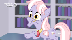 Size: 1920x1080 | Tagged: safe, screencap, dusty pages, earth pony, pony, the point of no return, bookshelf, collar, discovery family logo, elderly, female, glasses, mare, necktie, pointing, smiling, solo