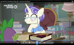 Size: 843x520 | Tagged: safe, screencap, first folio, spike, dragon, unicorn, the point of no return, book, canterlot library, clothes, discovery family logo, eyes closed, glasses, shirt, smiling, solo focus, table, windows media player, winged spike