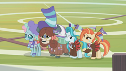 Size: 1360x768 | Tagged: safe, screencap, lighthoof, ocellus, shimmy shake, yona, yak, 2 4 6 greaaat, bow, clothes, cloven hooves, face paint, female, fence, field, flag, hair bow, hat, monkey swings, outdoors, pleated skirt, ponytail, ribbon, scarf, skirt, sweater, top hat, whistle, wig
