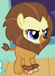 Size: 276x384 | Tagged: safe, screencap, earth pony, pony, made in manehattan, animal costume, background pony, clothes, costume, cowardly lion, cropped, female, filly, solo, the wizard of oz, violet cream