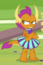 Size: 318x478 | Tagged: safe, screencap, smolder, dragon, 2 4 6 greaaat, angry, cheerleader outfit, cheerleader smolder, claws, clothes, confetti, cropped, cute, displeased, dragoness, fangs, female, horns, madorable, sin of pride, skirt, smolderbetes, solo, teenaged dragon, toes, unamused, upset