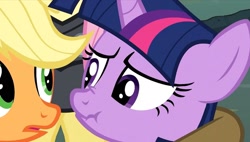 Size: 1907x1080 | Tagged: safe, screencap, applejack, twilight sparkle, earth pony, pony, unicorn, hearth's warming eve (episode), adorable face, cute, hearth's warming, scrunchy face