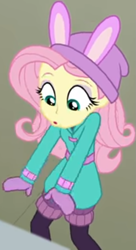 Size: 427x787 | Tagged: safe, screencap, fluttershy, better together, equestria girls, holidays unwrapped, bird whistle, blizzard or bust, bunny ears, clothes, coat, cropped, cute, female, leg warmers, looking down, mittens, shirt, shyabetes, undershirt, waistband, winter hat, winter outfit