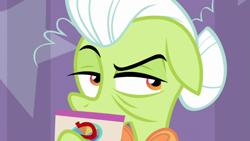 Size: 1920x1080 | Tagged: safe, screencap, granny smith, earth pony, pony, a trivial pursuit, asking, card, elderly, female, floppy ears, granny smith's scarf, hair bun, hoof hold, host, mare, narrowed eyes, obscured face, question, raised eyebrow, raised hoof, solo, trivia trot, wrinkles