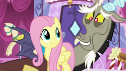 Size: 1280x720 | Tagged: safe, derpibooru import, screencap, discord, fluttershy, draconequus, pegasus, pony, what about discord?, carousel boutique, duo, mannequin, smiling, snaggletooth